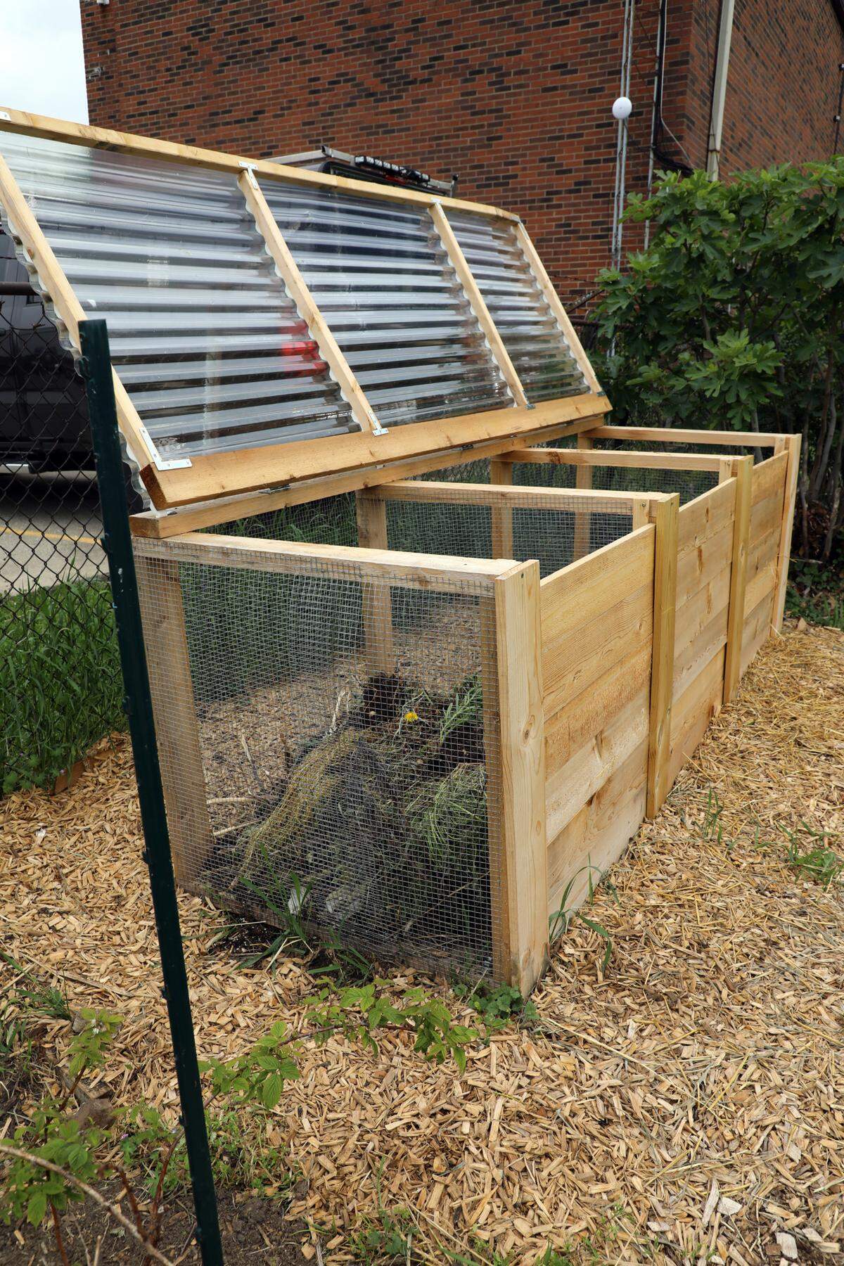 One of Seedleaf’s composting bins on Third Street in Lexington on May 17, 2021. Seedleaf, a nonprofit, is a community gardening and composting organization.