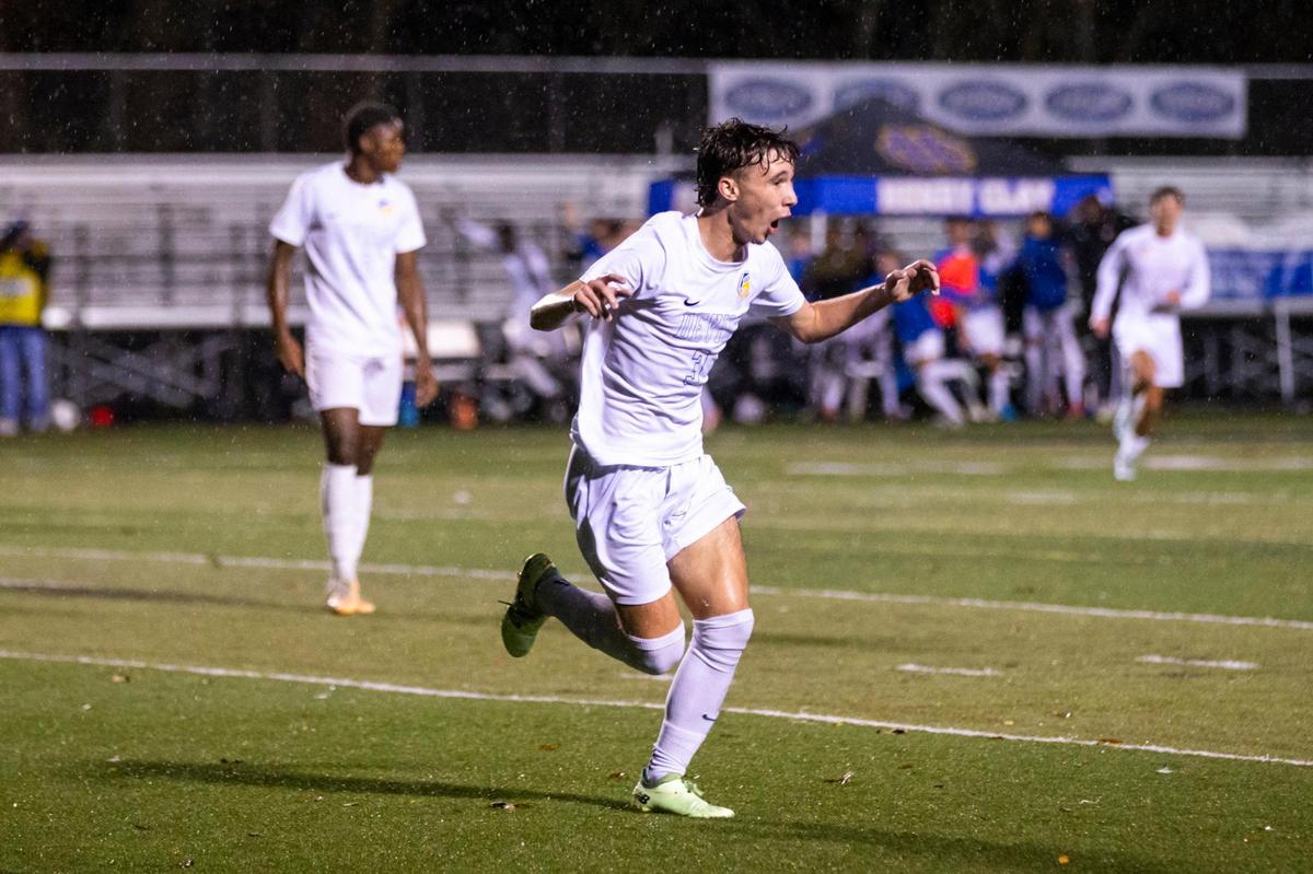 Henry Clay’s Braden Cundiff celebrates a goal Thursday night. Cundiff leads the Blue Devils in goals this season.