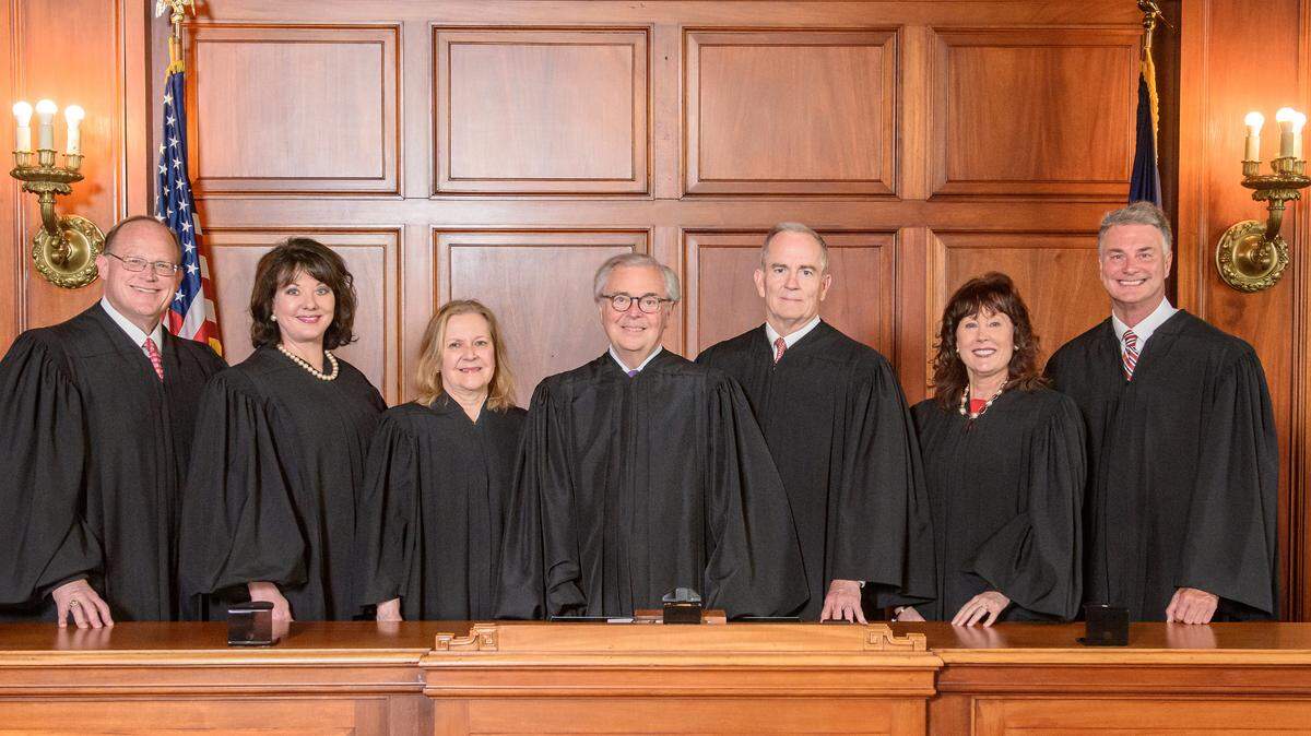 The Kentucky Supreme Court with Chief Justice John D. Minton Jr. is photographed with the addition of Justice Robert B. Conley, Tuesday, June 8, 2021, in the Supreme Court Courtroom in Frankfort, Ky. (AOC Photo/Brian Bohannon)
