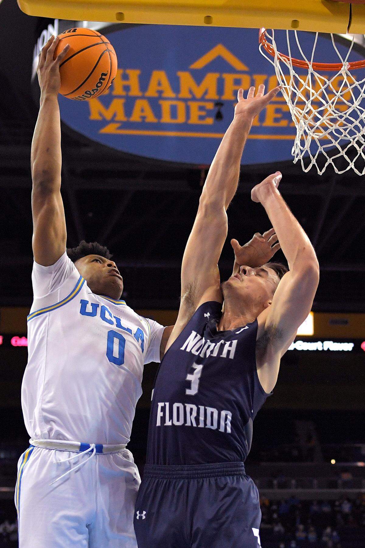 Carter Hendricksen guarded UCLA’s Jaylen Clark during a game last week in Los Angeles. Hendricksen, a Lexington Christian Academy graduate, is a junior at North Florida from Mount Sterling.