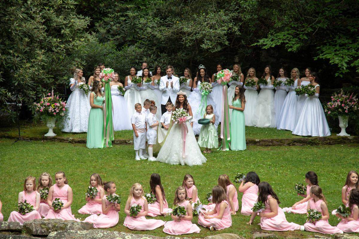 Western Kentucky University queen candidate Abigail Ray Canter is presented to the audience Saturday after she was crowned by Gov. Andy Beshear at Laurel Cove Amphitheater in Pine Mountain State Resort Park during the 90th Kentucky Mountain Laurel Festival in Pineville.