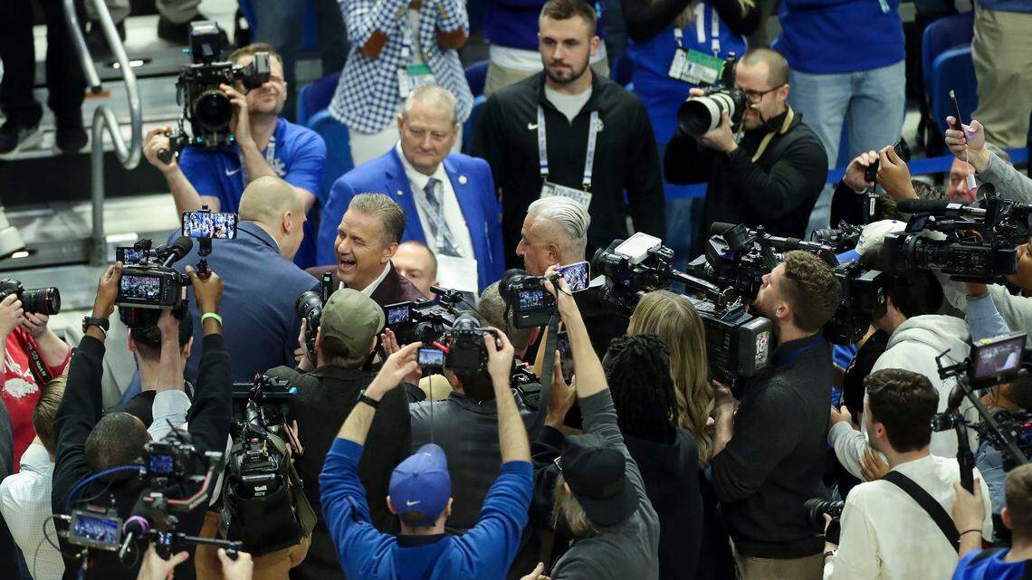 Arkansas head coach John Calipari greets Kentucky head coach Mark Pope before Saturday’s game at Rupp Arena.