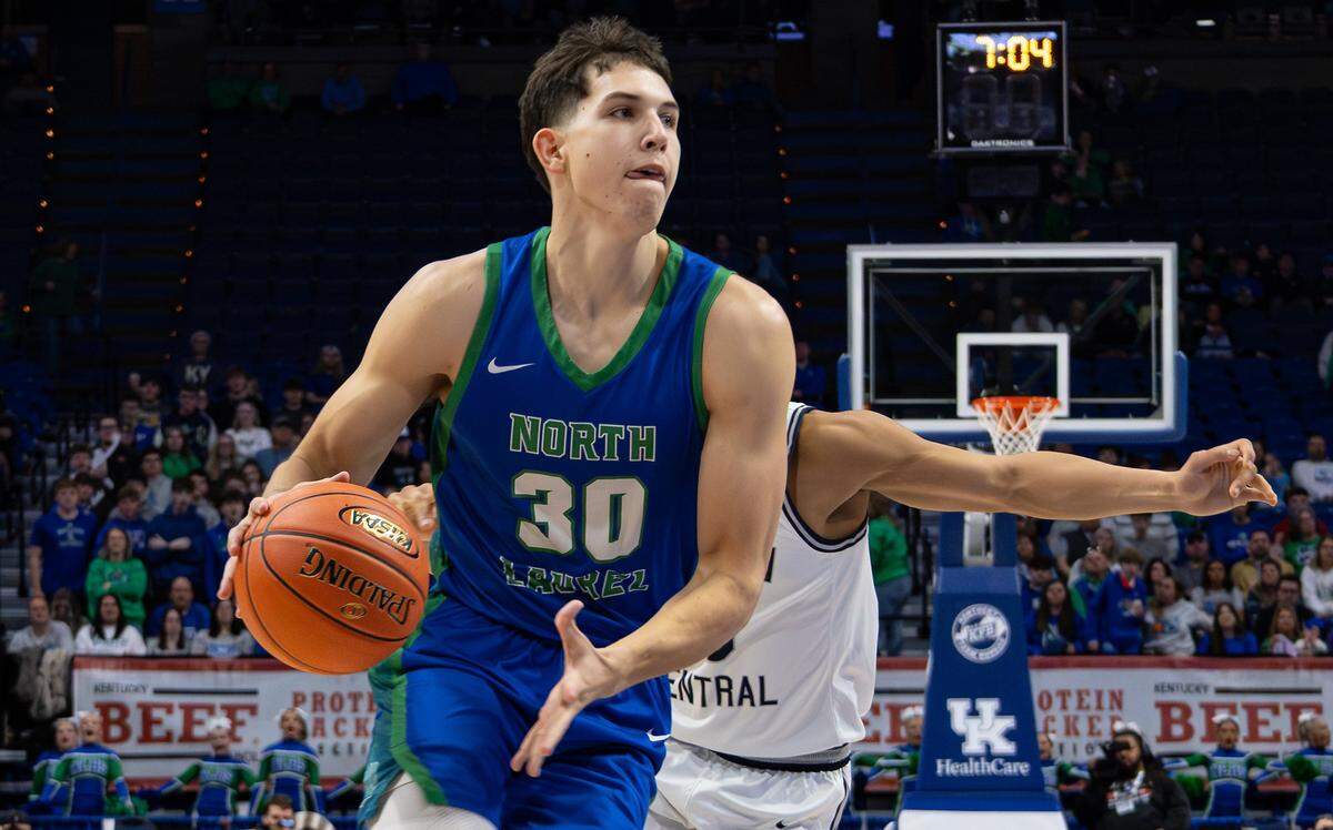 North Laurel's Reece Davidson drives the ball down court for a successful two-point layup during the UK HealthCare Boys' Basketball Sweet 16 state tournament first-round game between Warren Central and North Laurel at Rupp Arena on March 18, 2026.