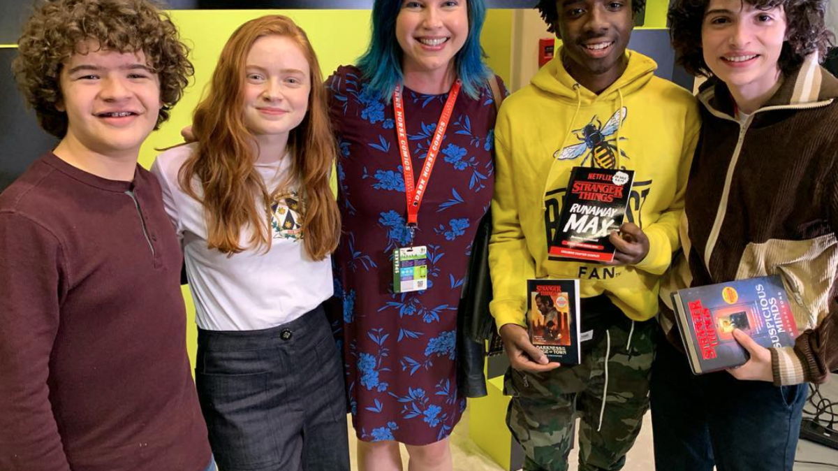 Lexington-based author Gwenda Bond, center, poses with members of the Stranger Things cast, including Gaten Matarazzo (left), Sadie Sink, Caleb McLaughlin and Finn Wolfhard (right).