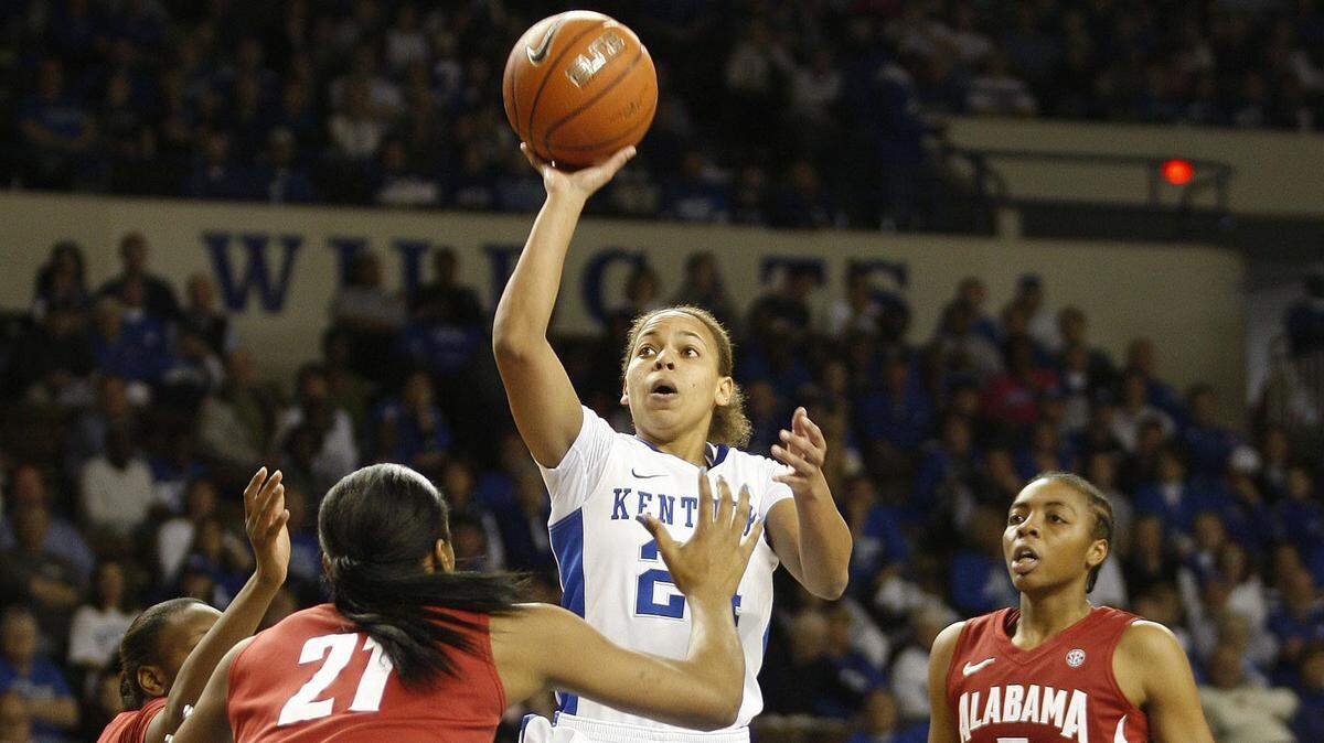 Kentucky's Amber Smith, who led the Cats to two Elite Eight trips in her time as point guard, has been hired as a full-time assistant coach.