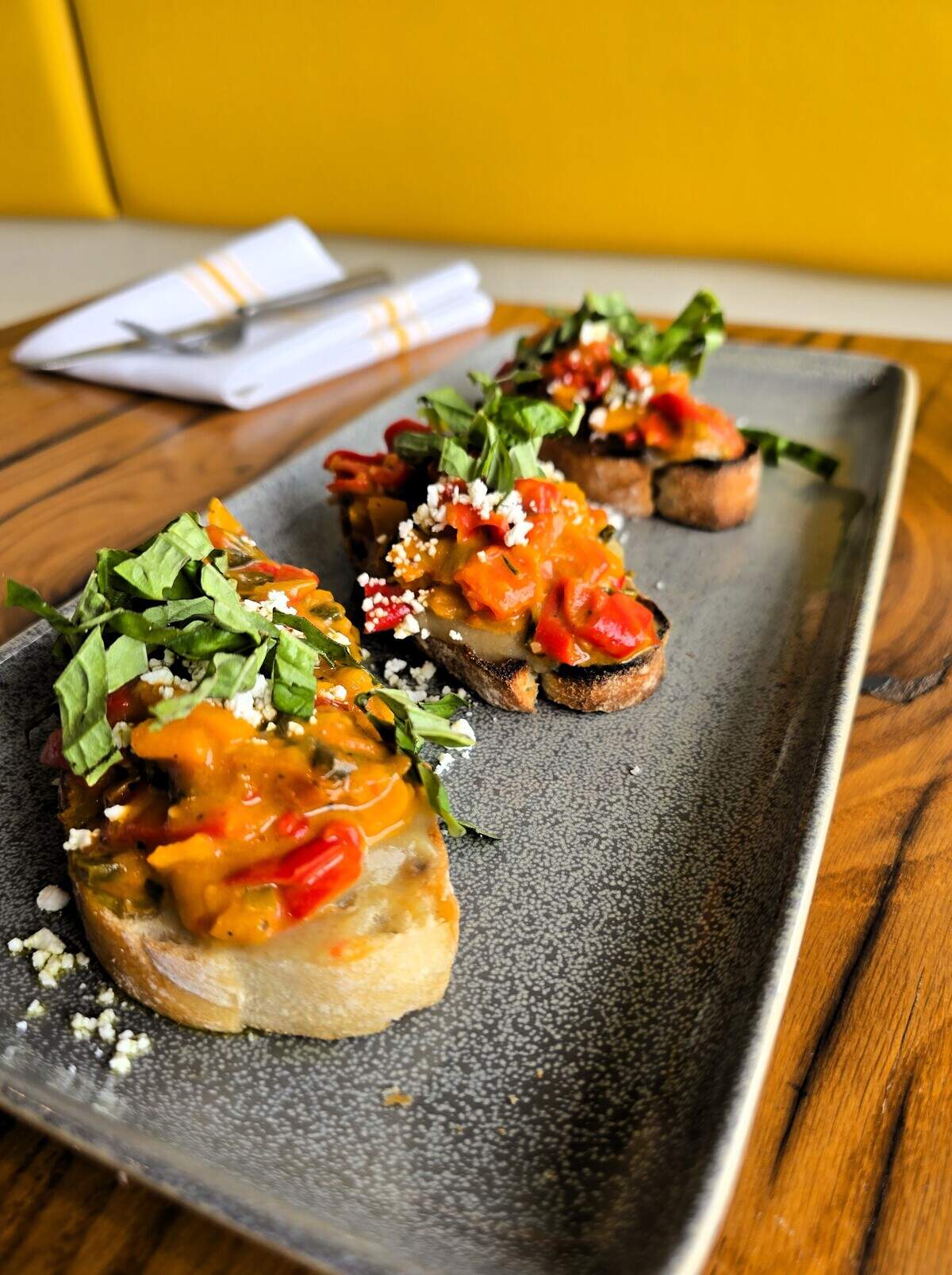 The new summer menu at Crust includes Summer Burrata, made with cantaloupe, papaya, gingered sherry vinaigrette, toasted peanut, fresh arugula, basil and cilantro.