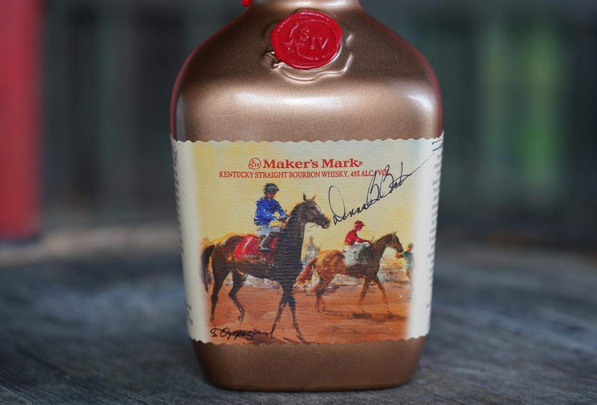 The Maker’s Mark bottles will feature signed artwork by three different Thoroughbred racing artists and be signed by three top female jockeys, including Donna Barton Brothers.
