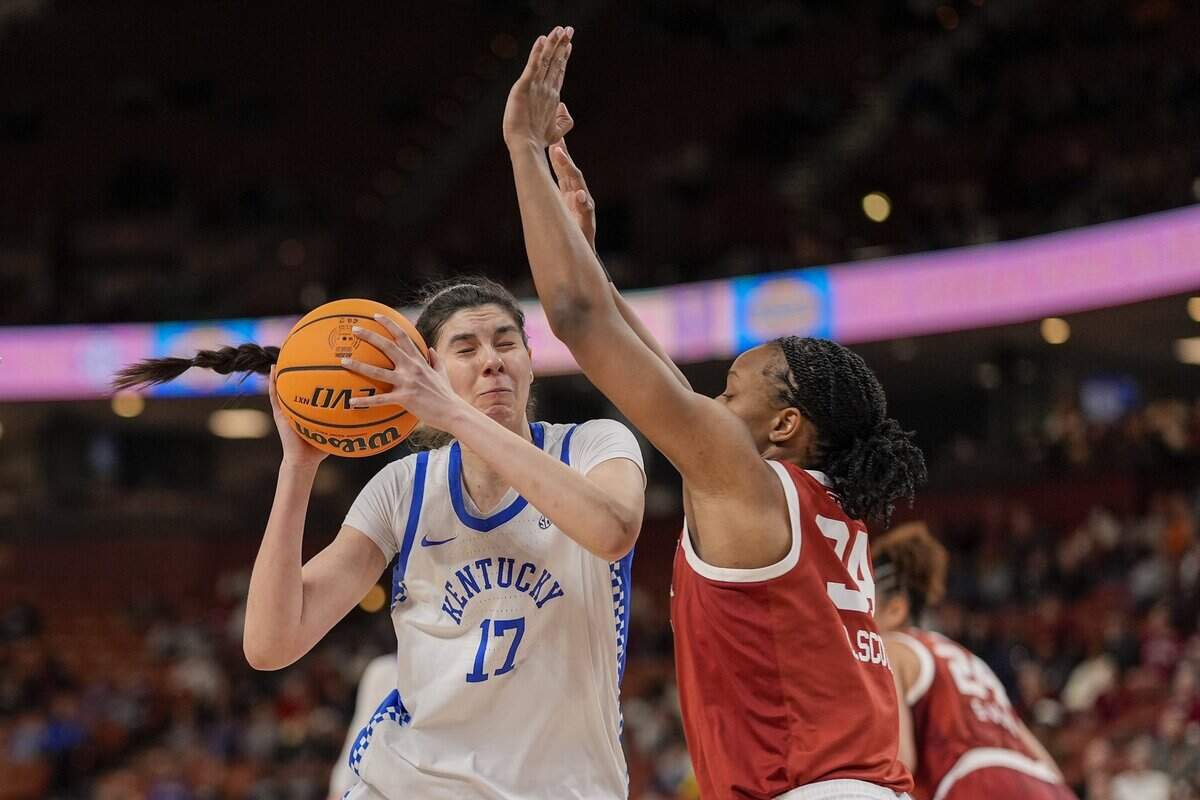 Mar 7, 2025; Greenville, SC, USA; Kentucky Wildcats center Clara Silva (17) goes to the basket against Oklahoma Sooners forward Liz Scott (34) during the second half at Bon Secours Wellness Arena. Mandatory Credit: Jim Dedmon-Imagn Images