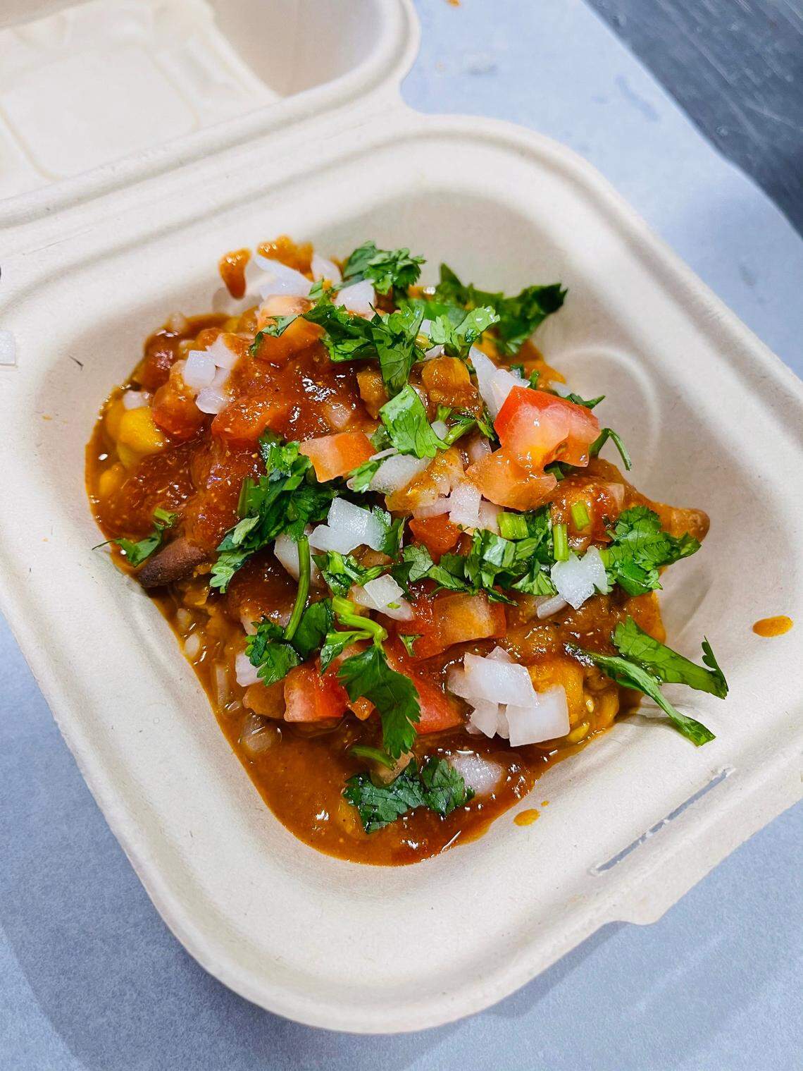 Samosa chaat, an Indian street food, from MirchiMex, an Indian Mexican Fusion concept that is served out of two Gallops gas stations, one in Lexington and one in Frankfort. Owner Sam Patel said that all the meat, even for the Mexican dishes, is marinated in Indian flavors for a spicy twist.