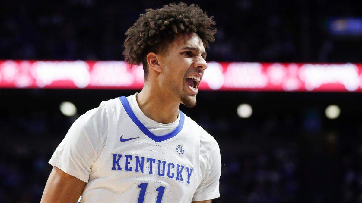 Kentucky Wildcats guard Dontaie Allen (11) celebrates a basket during a game against the North Florida Ospreys at Rupp Arena in Lexington, Ky., Friday, Nov. 26, 2021.