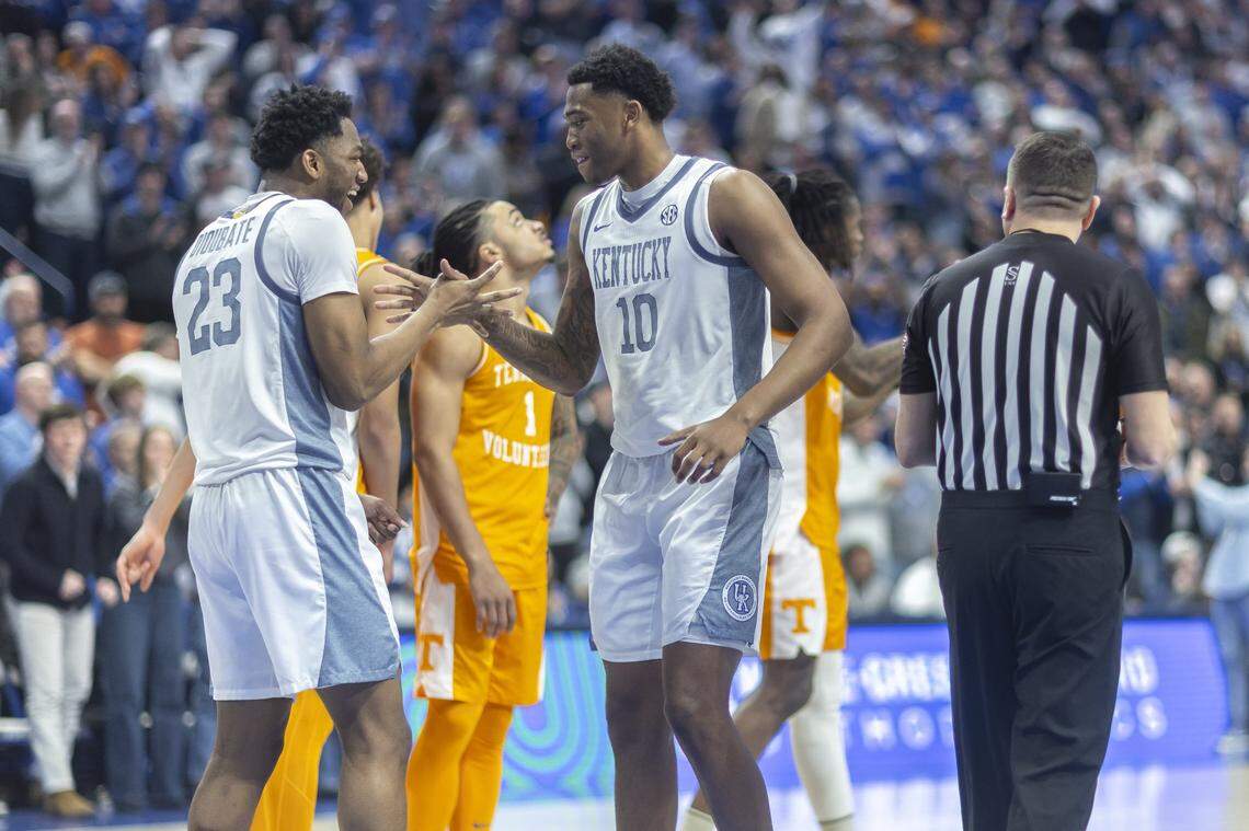 Kentucky basketball forwards Mouhamed Dioubate (23) and Brandon Garrison (10) celebrate during Saturday’s game against Tennessee at Rupp Arena. UK wore throwback home uniforms for the contest, drawing inspiration from the 1995-96 NCAA championship season.
