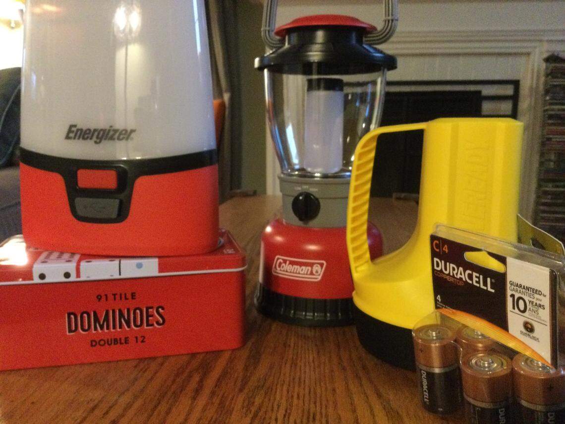 Lanterns, flashlights, extra batteries and off-line games like dominoes can help make life livable until the power returns.