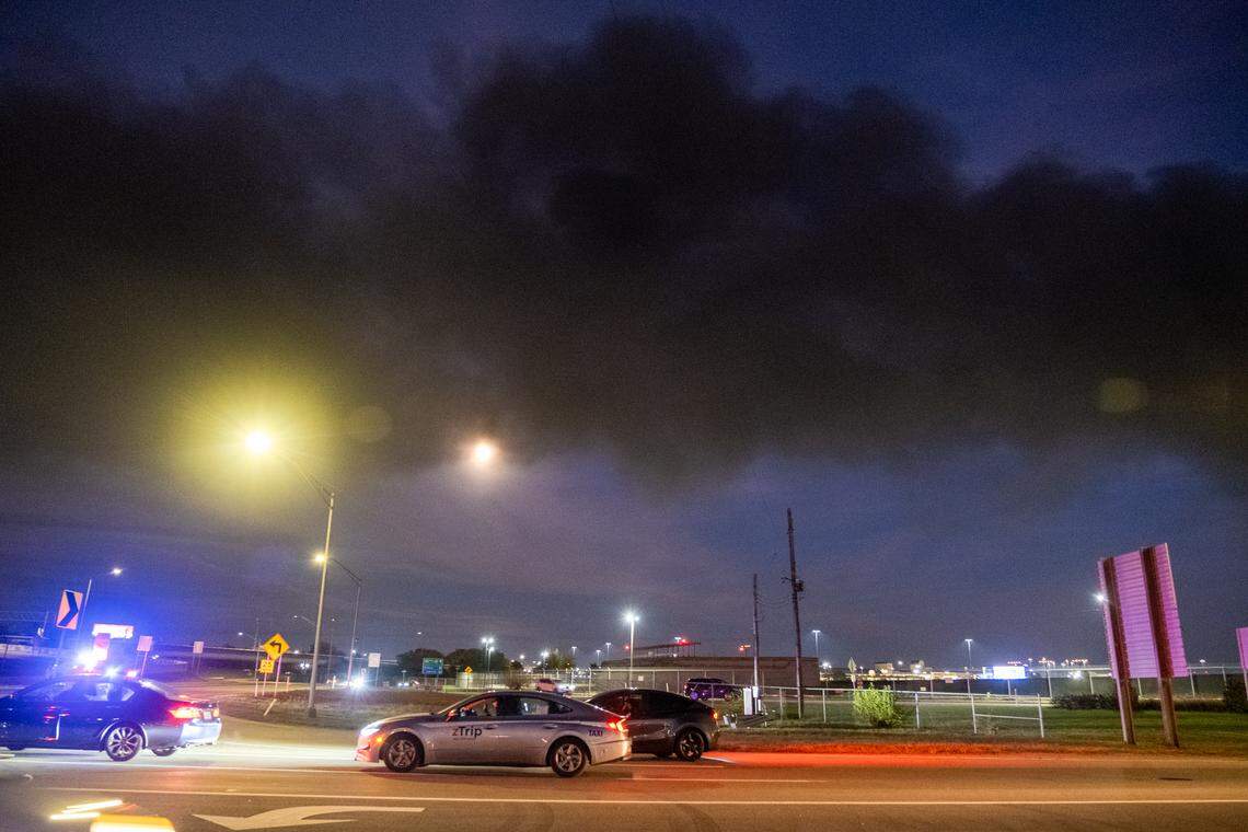 Smoke from the Nov. 4, 2025, UPS plane crash in Louisville, Ky., as seen over Crittenden Drive near the airport.