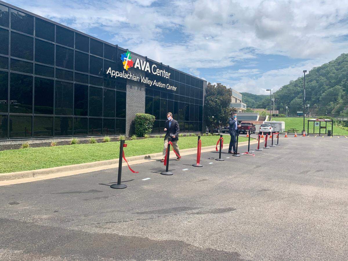 Gov. Andy Beshear walks by the Appalachian Valley Autism (AVA) Center after a ribbon-cutting ceremony Friday. The center opened last month.
