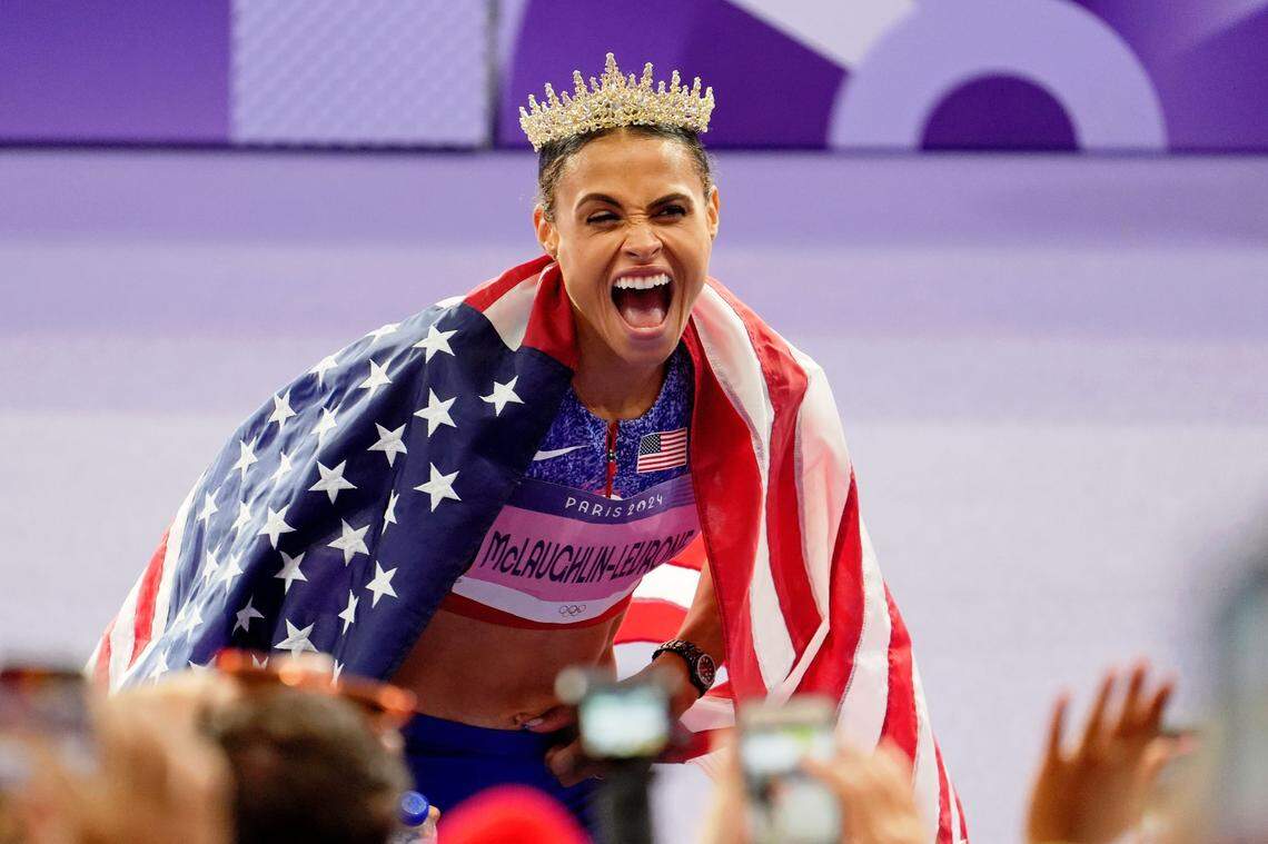 Aug 8, 2024; Paris Saint-Denis, France; Sydney McLaughlin-Levrone (USA) celebrates after winning the women's 400m hurdle final during the Paris 2024 Olympic Summer Games at Stade de France. Mandatory Credit: John David Mercer-USA TODAY Sports