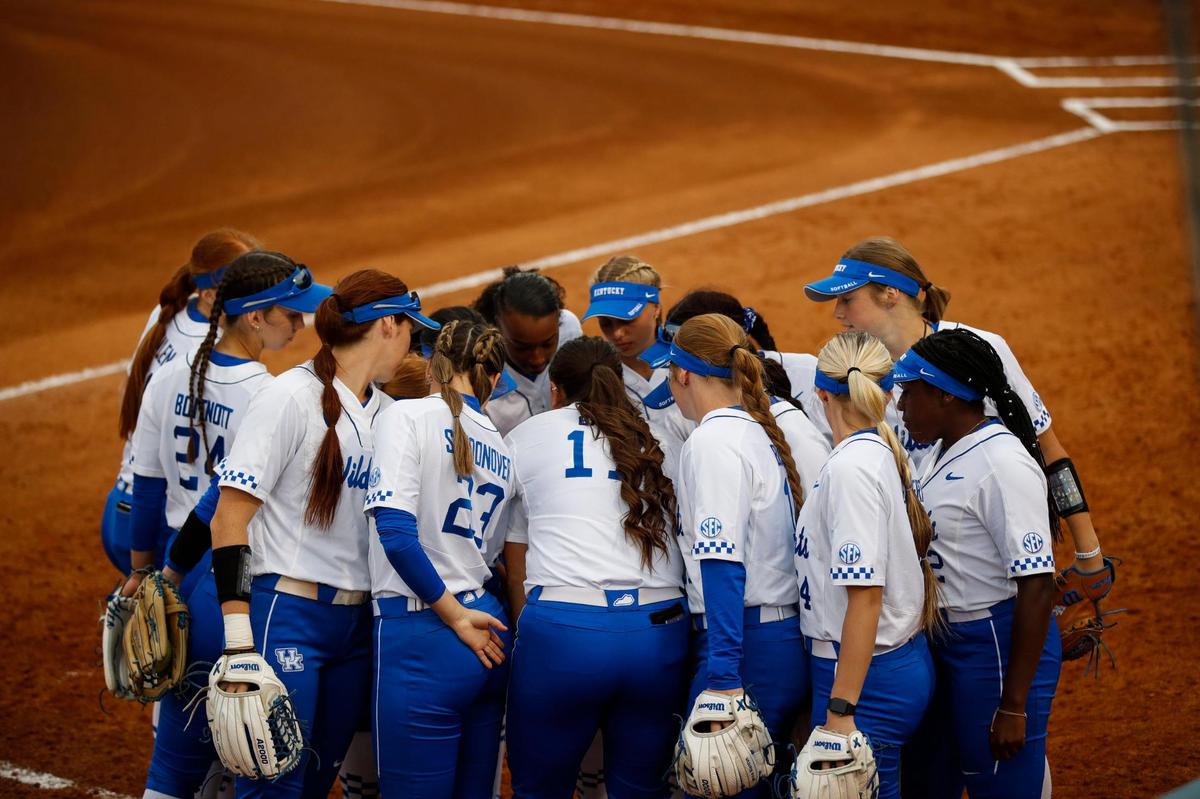 The Kentucky Wildcats huddle before facing the University of Oklahoma Sooners during the game at John Cropp Stadium in Lexington, Ky., Tuesday, March 22, 2021.