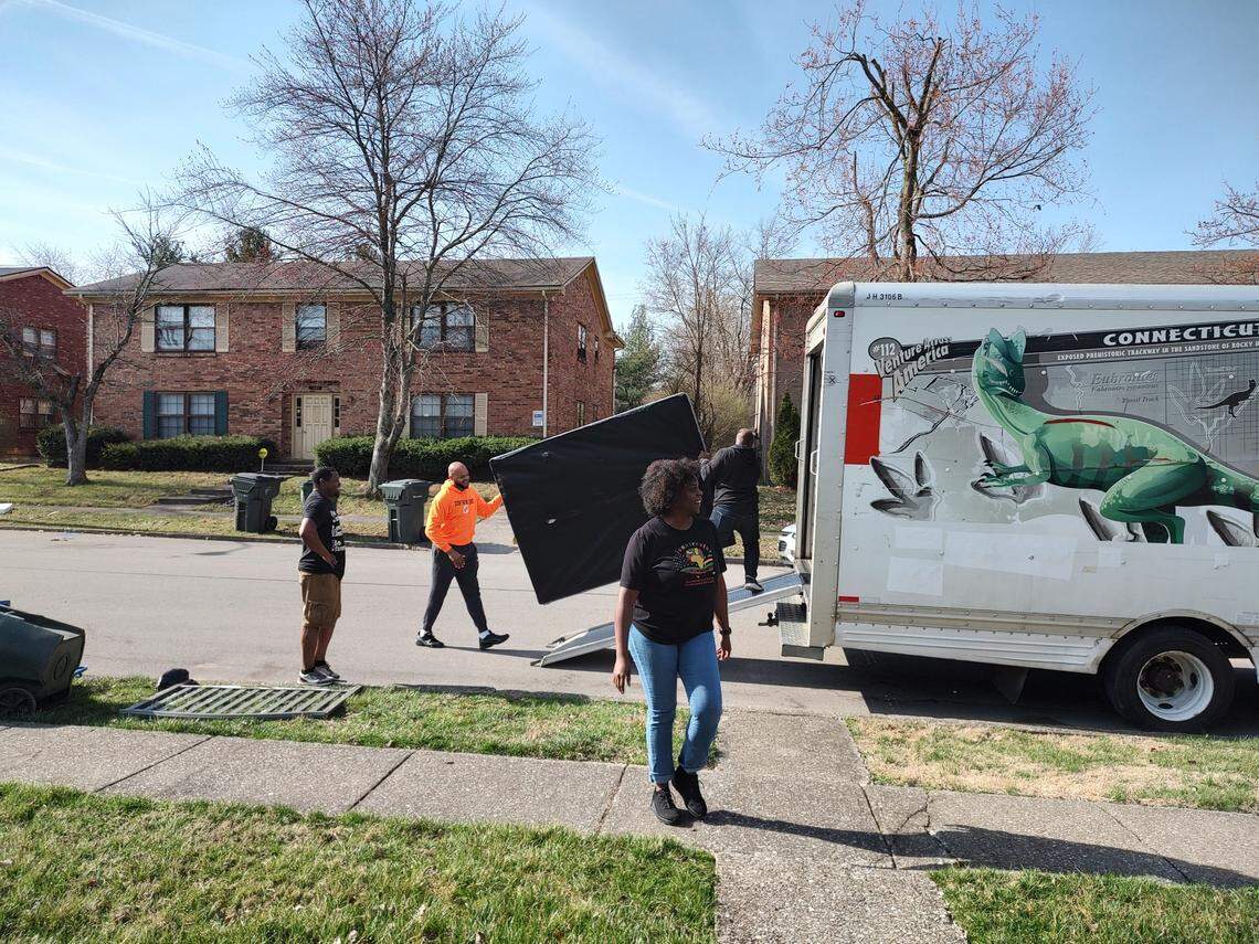 Marcus Patrick, left, Devine Carama, Tania Walker and Kenneth Payne helped a family affected by gun violence move to a new location in Lexington, KY, Mar. 1, 2023. ONE Lexington provided the volunteers, truck and first month’s rent to the family.