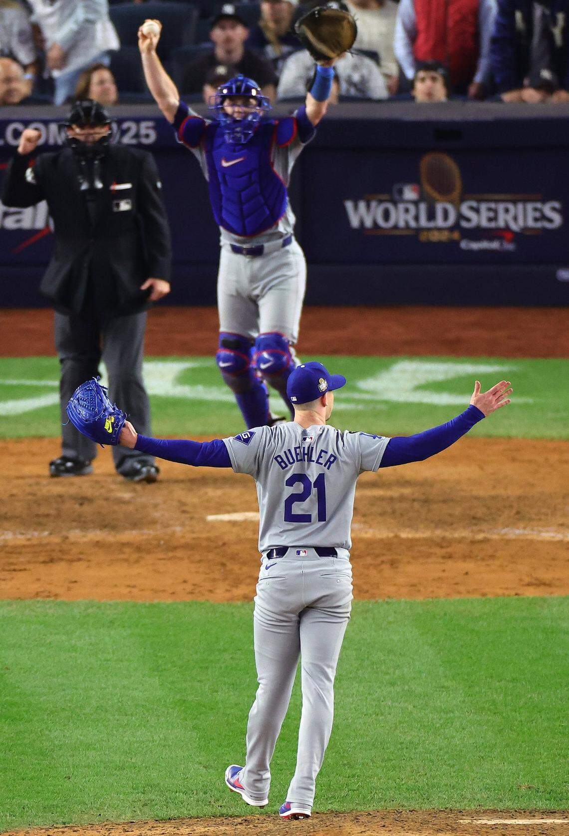 Los Angeles Dodgers pitcher Walker Buehler (21) and catcher Will Smith celebrated after the final out in a 7-6 win against the New York Yankees in Game 5 to clinch the World Series at Yankee Stadium. Buehler is a Lexington product, while Smith grew up in Louisville.