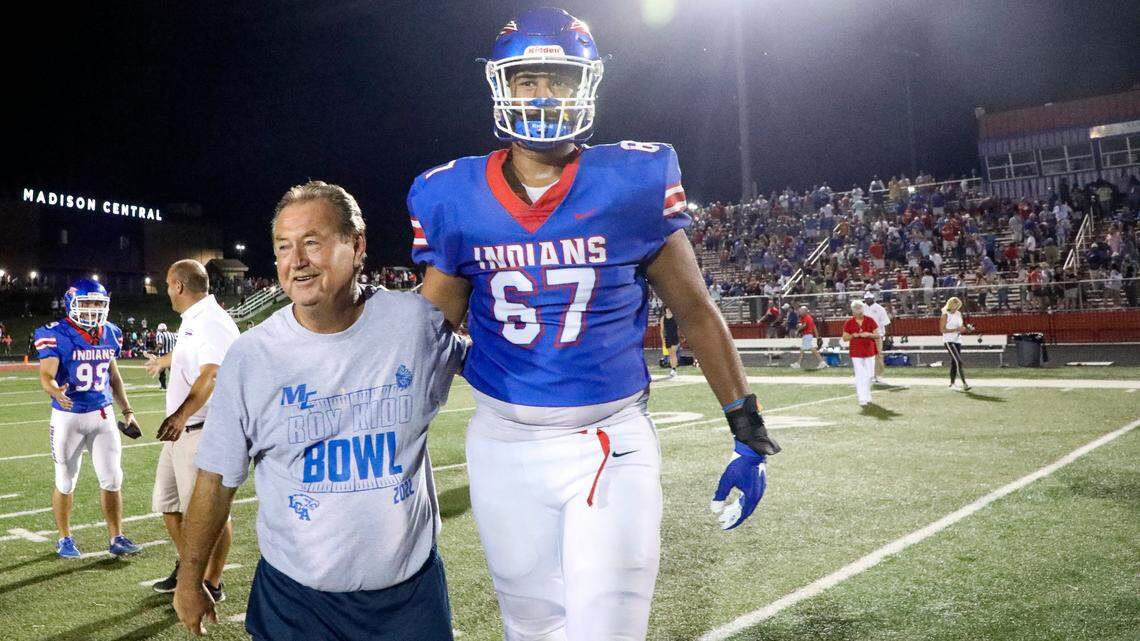 Madison Central Coach Mike Holcomb, left, says of UK offensive tackle commit Malachi Wood (67): “He’s a great young man. He makes good grades and does all the right things.”