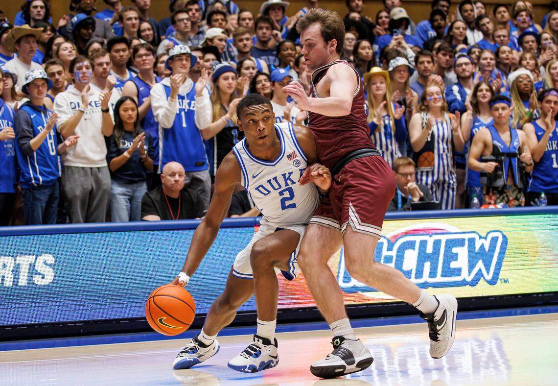 Bellarmine’s Ben Johnson, right, the former Lexington Catholic High School star, guarded Duke’s Jaylen Blakes (2) during the Knights’ 74-57 loss to the Blue Devils in Cameron Indoor Stadium last week.