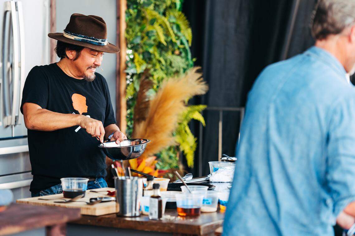 Louisville chef Ed Lee did a cooking demo on the Fork & Flask stage at Bourbon & Beyond. Many chefs also include bourbon in their demonstrations.
