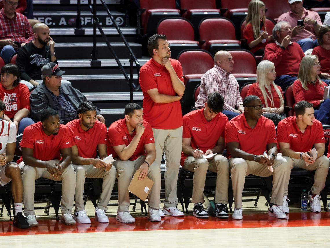 New Western Kentucky University men’s basketball coach Hank Plona, standing, was an assistant on Steve Lutz’s WKU staff last season.