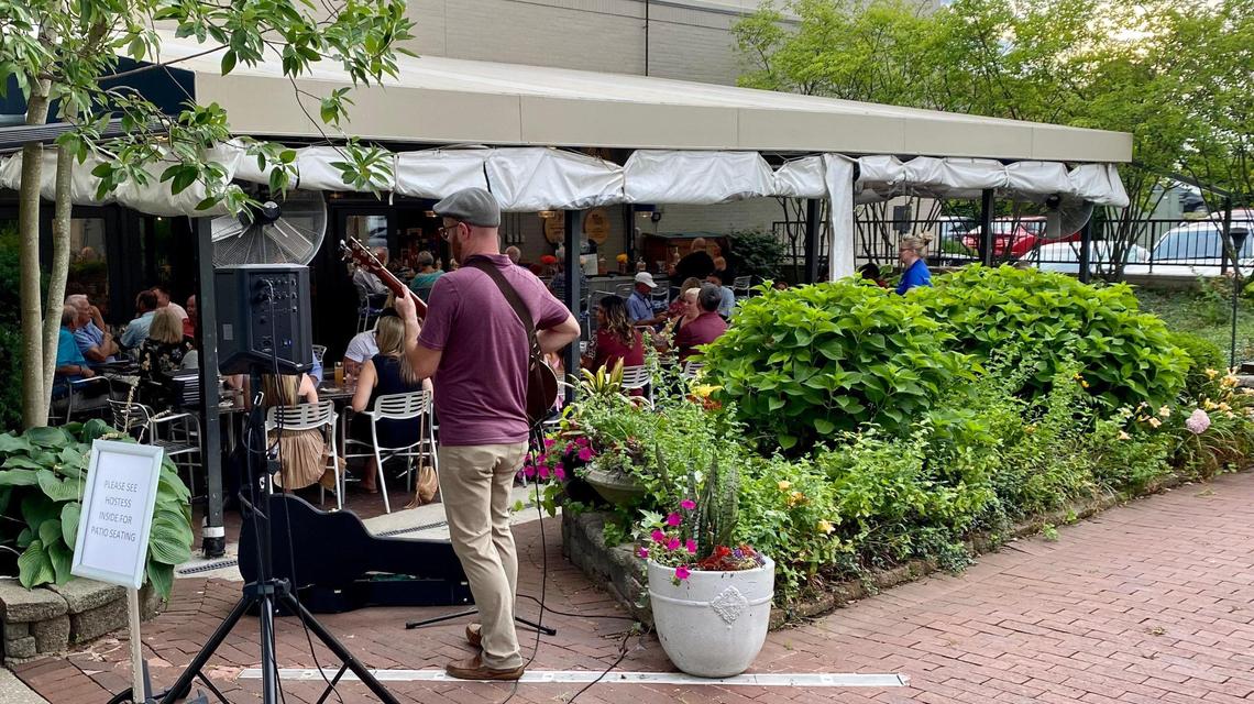 The outdoor dining area at Azur Restaurant and Patio in the Beaumont neighborhood often has live music, making it popular with local foodies.
