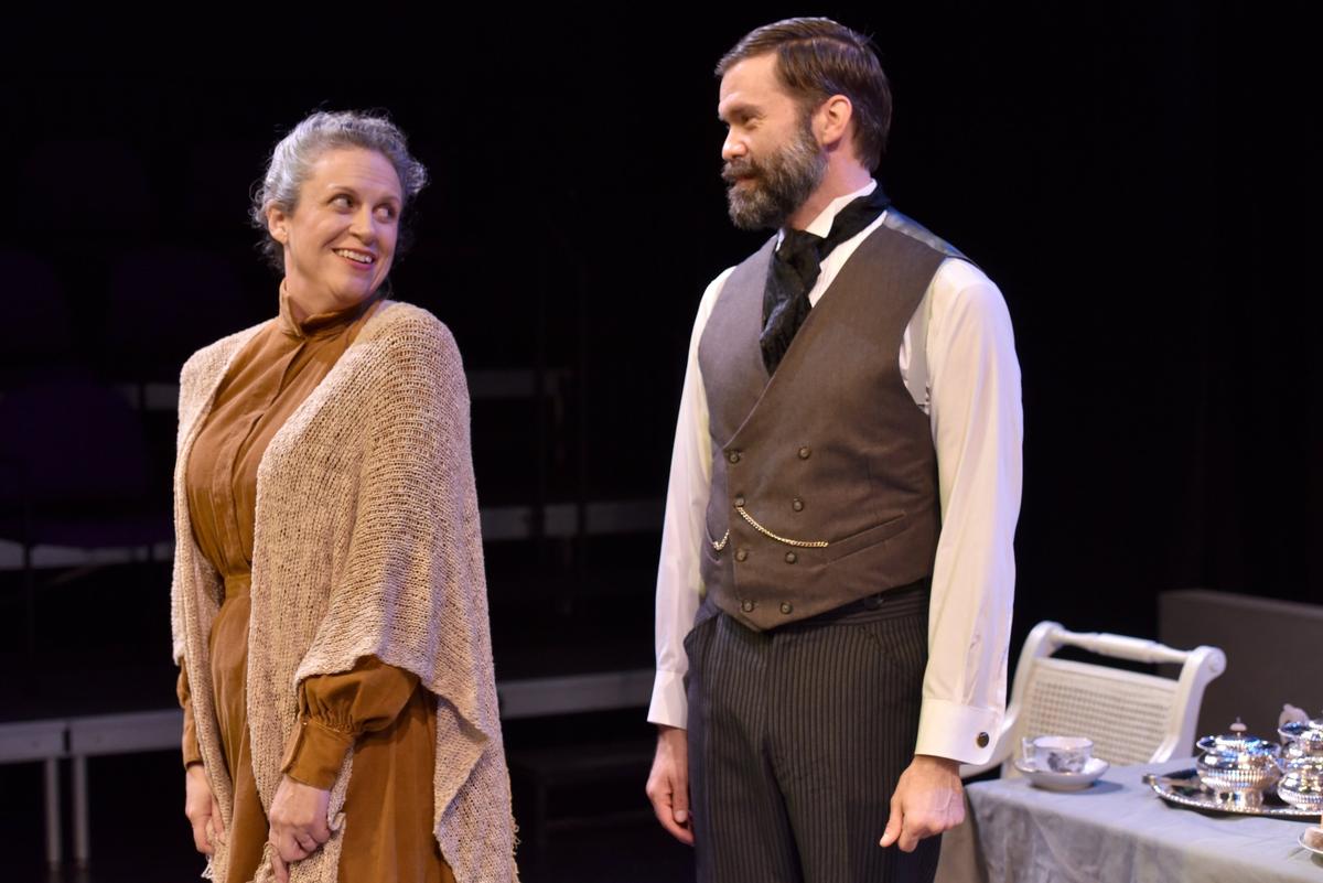 Catherine Gaffney is Miss Prism and Shayne Brakefield is Rev. Chausible in AthensWest Theatre Company’s production of Oscar Wilde’s “The Importance of Being Earnest.”