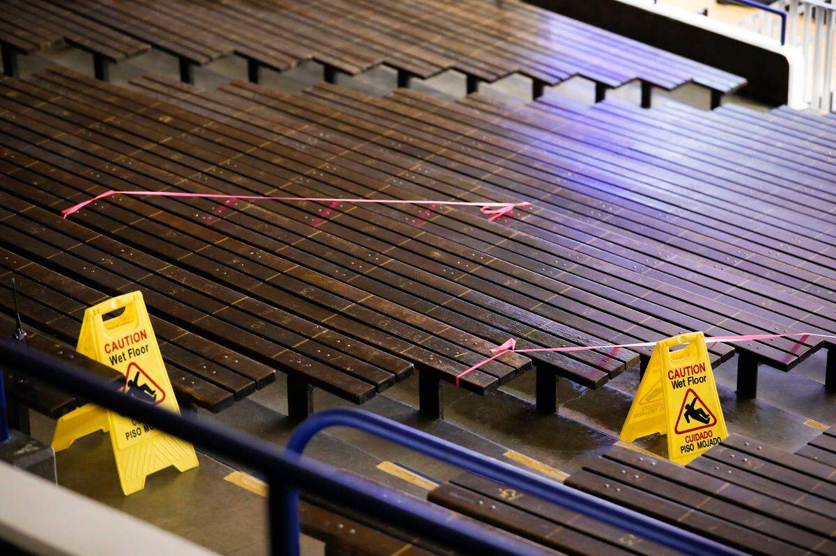 Signs and tape cordoned off areas where water was leaking from the ceiling during Kentucky’s women’s basketball game against Vanderbilt last February. Memorial Coliseum is scheduled to undergo major renovations starting next year.