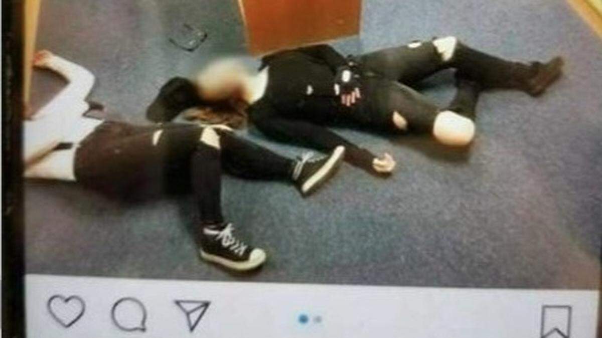 Two Adair County High School students dressed as Columbine shooters for Halloween.