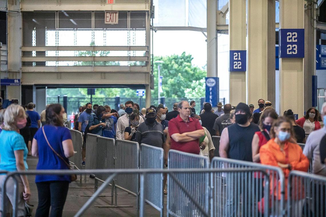 Fayette County voters wait in line to cast their ballots at Kroger Field in Lexington, Ky., on Tuesday, June 23, 2020.