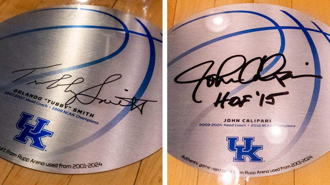Former University of Kentucky men’s basketball coaches Tubby Smith and John Calipari each signed the new table at Tony’s of Lexington that is made from a section of the Rupp Arena basketball court they used to coach on. 