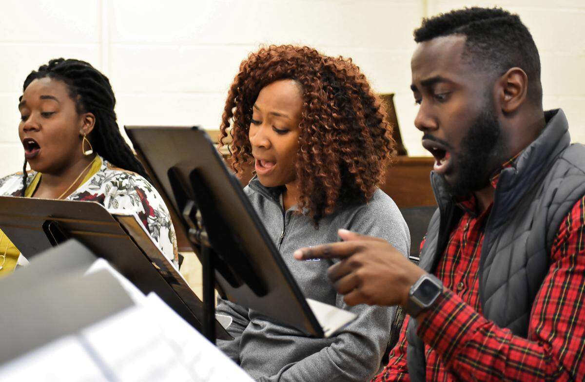 Members of UK Opera Theatre rehearse selections from the Broadway musical “The Color Purple” in preparation of their performance at  the Carnegie Center. 