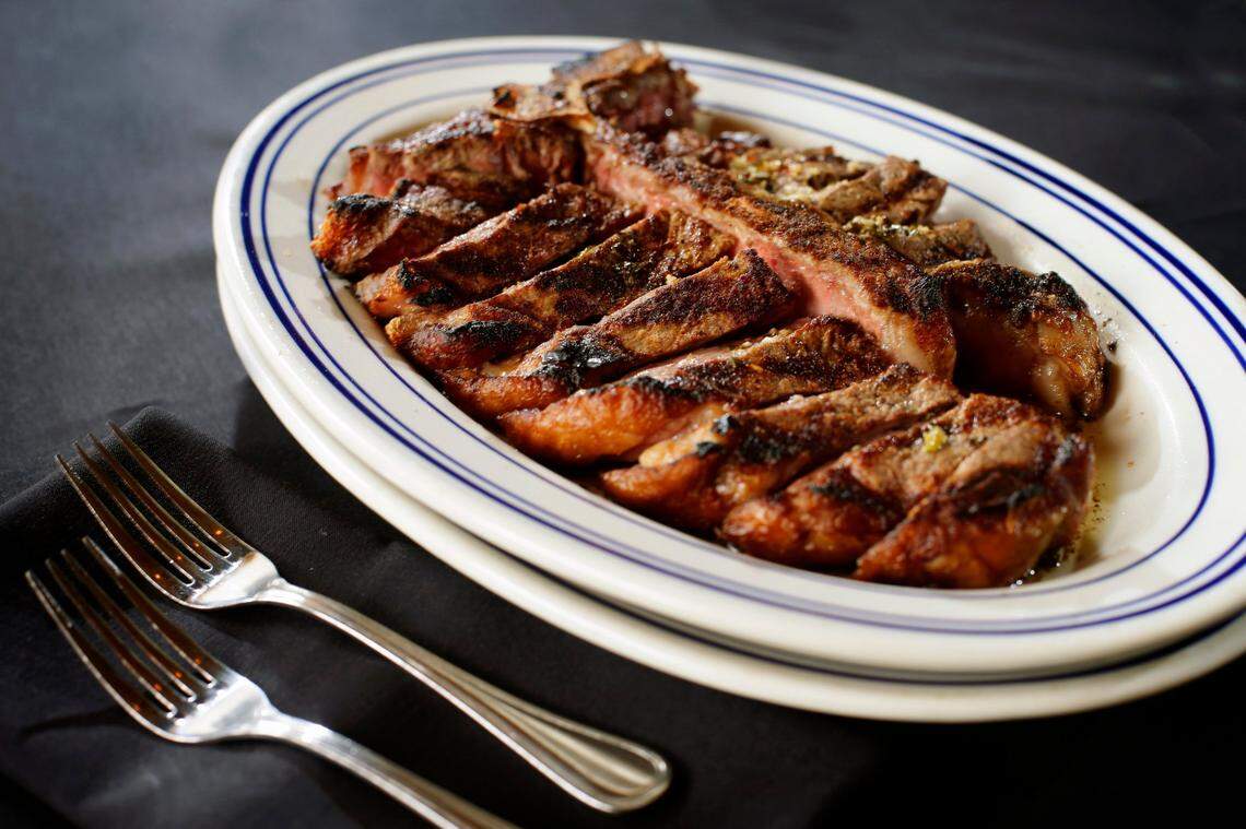 The 40 oz. porterhouse steak for two includes four sides at the Blue Heron Steakhouse.