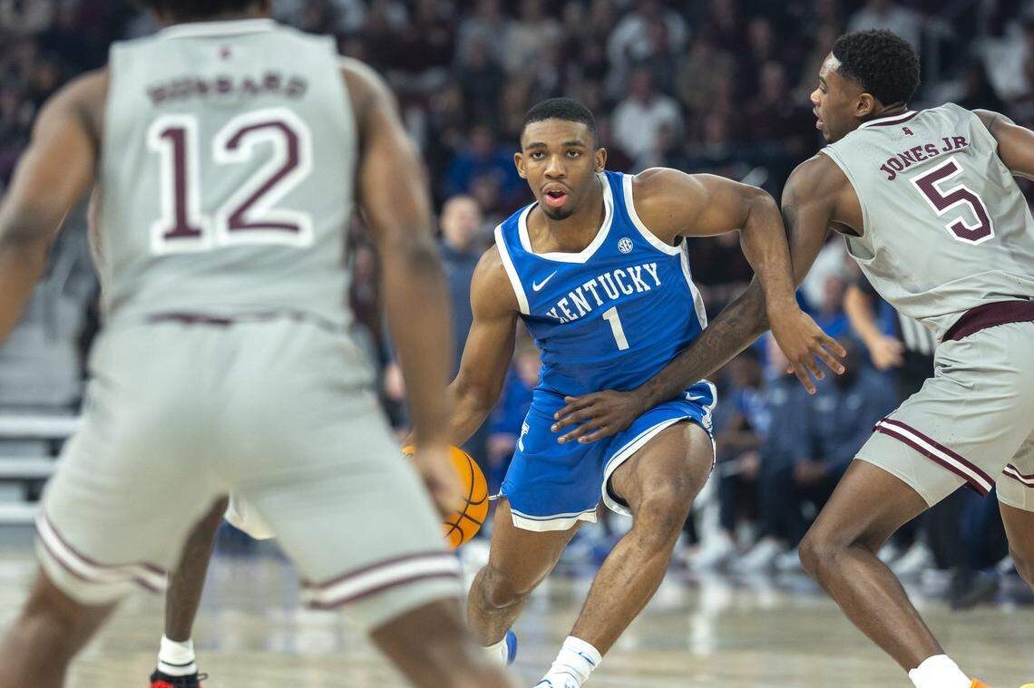 Kentucky’s Lamont Butler (1) drives against Mississippi State’s Shawn Jones Jr. on Saturday night in Starkville. UK’s point guard finished with 10 points, eight assists and no turnovers.