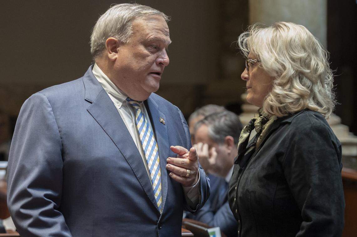 Kentucky Senate President Robert Stivers, R-Manchester, speaks with Sen. Robin Webb, D-Grayson, in the Senate chambers at the Kentucky state Capitol in Frankfort, Ky., on Monday, April 15, 2024.