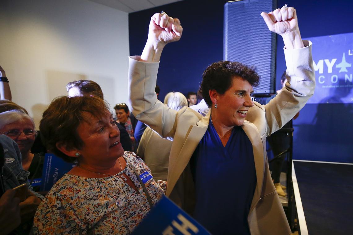 Amy McGrath celebrated after her victory over Jim Gray in Kentucky's 6th Congressional District primary election Tuesday at the Copper Fox Event Center in Richmond.