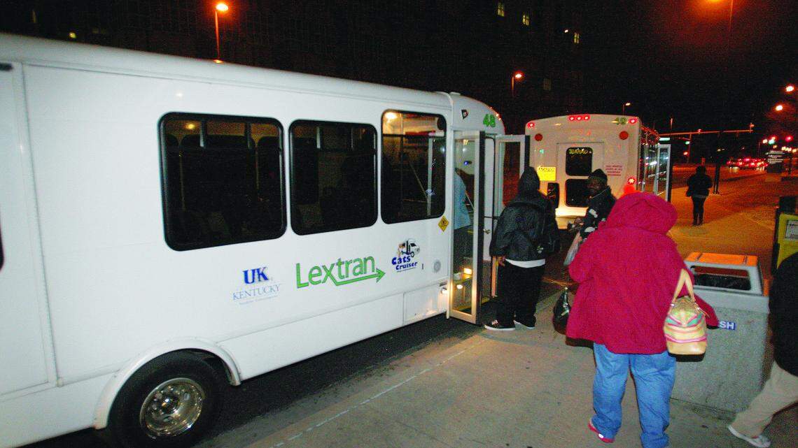 Workers boarded a Lextran bus after their shifts at the Kentucky Clinic on South Limestone late Monday night.  