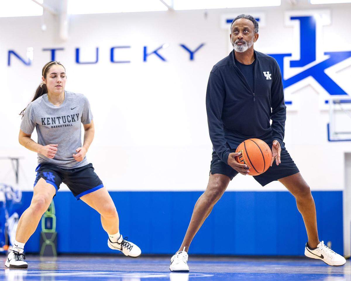 First-year Kentucky head coach Kenny Brooks puts All-America transfer Georgia Amoore through drills during a UK practice. Amoore, a transfer from Virginia Tech, is the centerpiece of a new-look Wildcats team that has only two holdovers from last season.
