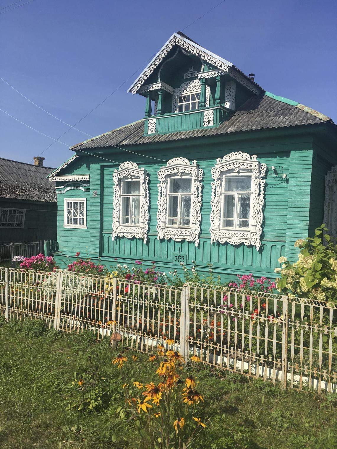 There are, literally, thousands of wooden farmhouses in this style, dating from the mid-19th century, in the countryside. Although it’s not evident here, they include two sections under one roof. In the front is where farm families lived, in the upper portion, and the lower story and rear were a barn that housed livestock and equipment.