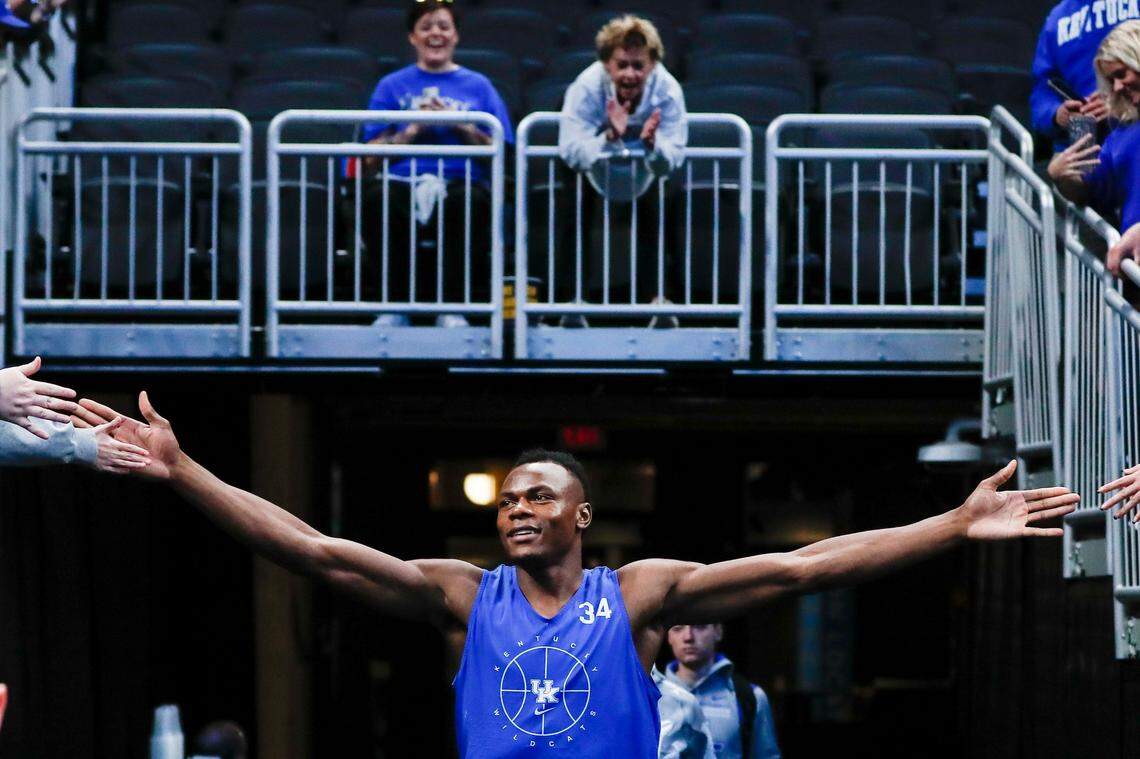 Kentucky’s Oscar Tshiebwe greeted fans who came out to watch the Wildcats’ NCAA Tournament open practice on Wednesday afternoon at Gainbridge Fieldhouse in Indianapolis.