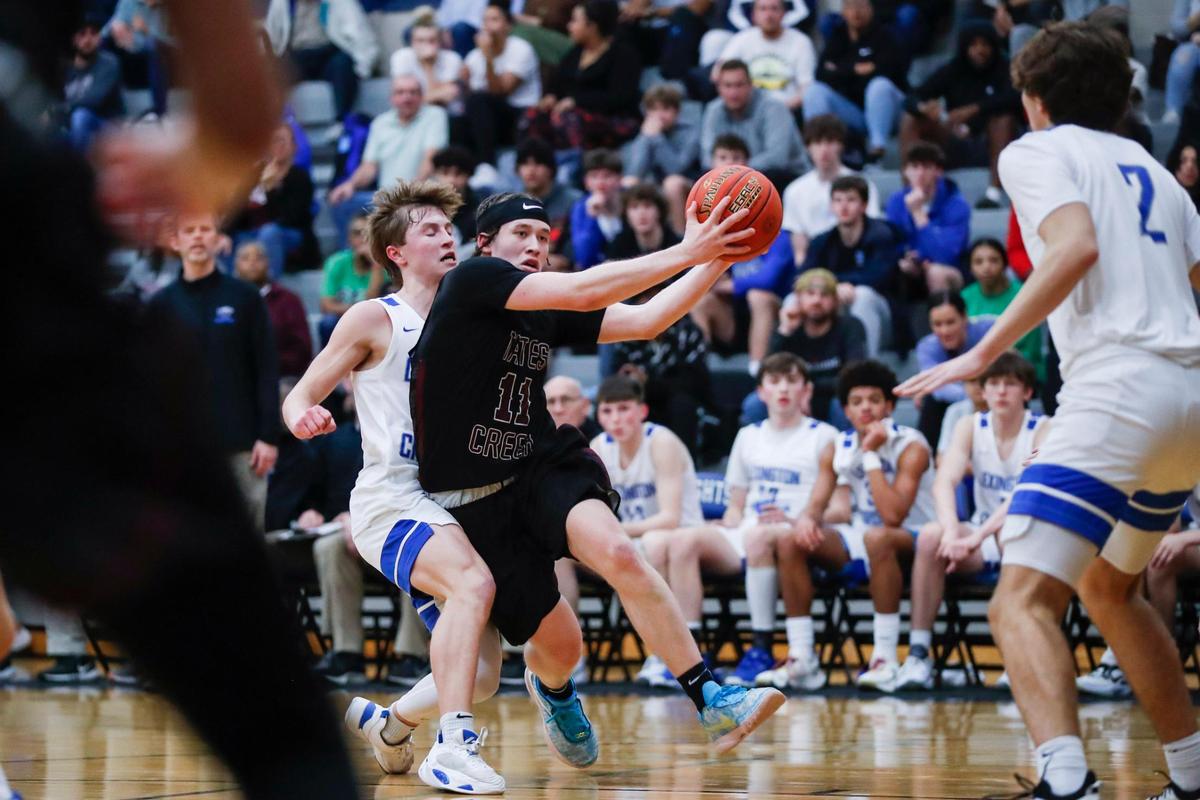 Tates Creek’s Dawson Garth (11) drives to the basket against Lexington Christian during their district tournament game at Lexington Catholic on Wednesday night.