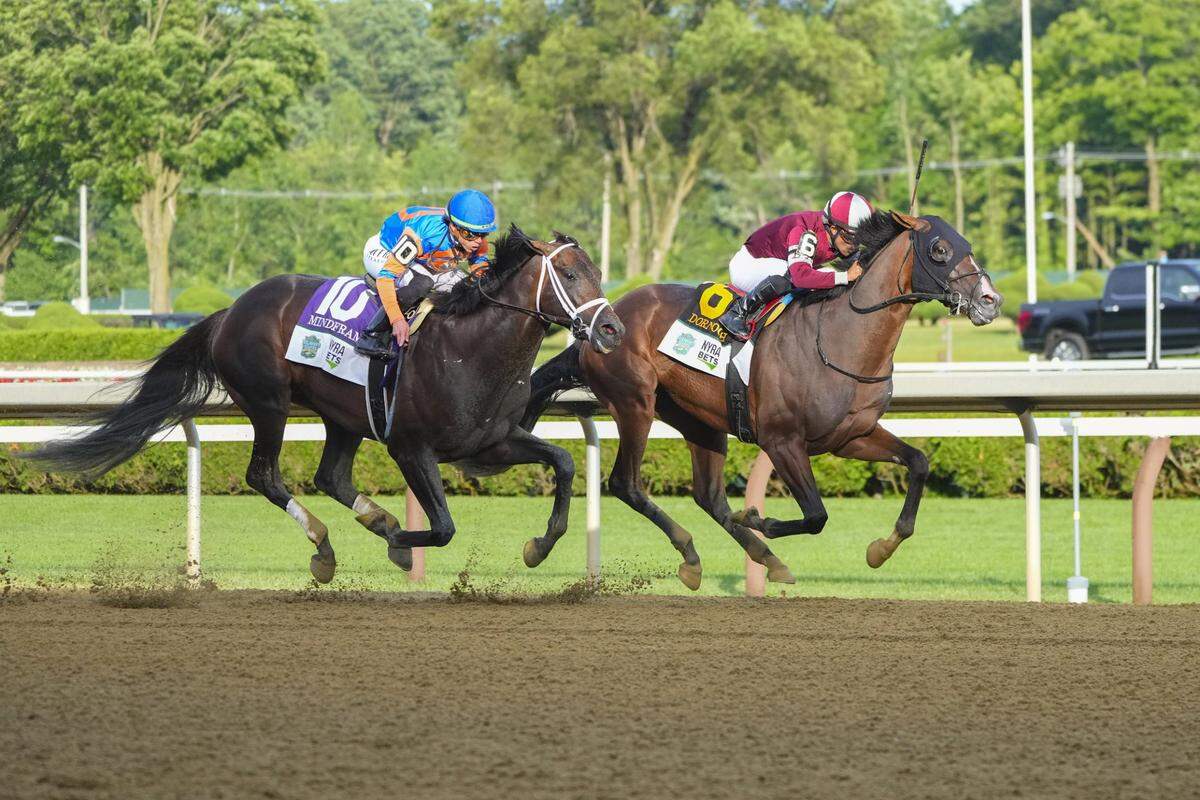 Jun 8, 2024; Saratoga Springs, NY, USA; Dornoch with Luis Saez up (6) in the lead down the final front stretch followed by Mindframe with Irad Ortiz Jr. up (10) during the Belmont Stake at Saratoga Race Course. Mandatory Credit: Gregory Fisher-USA TODAY Sports