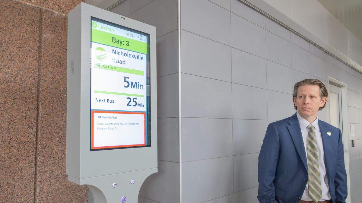 Lextran General Manager Fred Combs shows the touchscreen kiosks with real-time bus trackers at the newly renovated Transit Center in downtown Lexington, Ky., on Feb. 6, 2026.