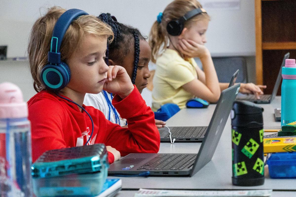 Second grade students of Athens-Chilesburg Elementary school have quiet study sessions on their laptops, on Nov. 1, 2023.