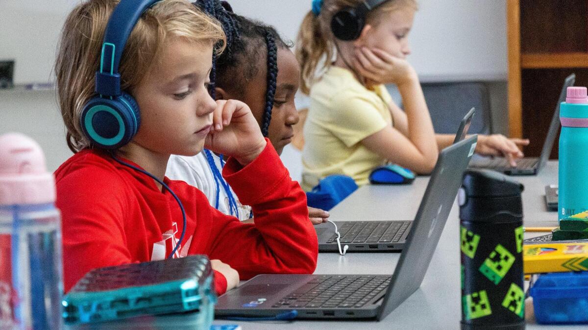 Second grade students of Athens-Chilesburg Elementary school have quiet study sessions on their laptops, on Nov. 1, 2023.