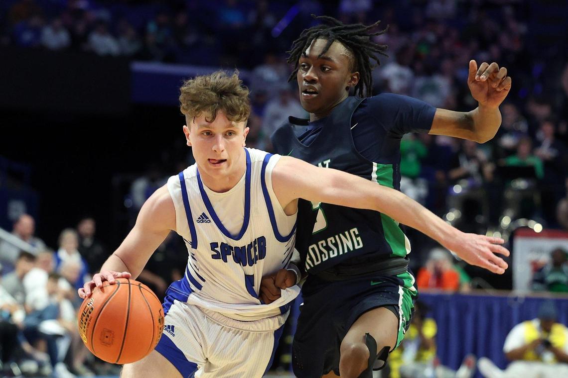 Spencer County’s Luke Erhardt drives against Great Crossing’s Jaylen Warren on Wednesday night. Erhardt finished with 11 points and four assists.