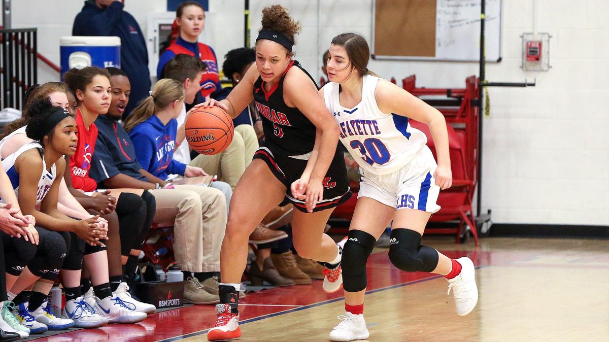 Paul Laurence Dunbar’s Elise Ellison-Coons averaged 18.1 points and 9.8 rebounds her senior year for the 14-4 Bulldogs.