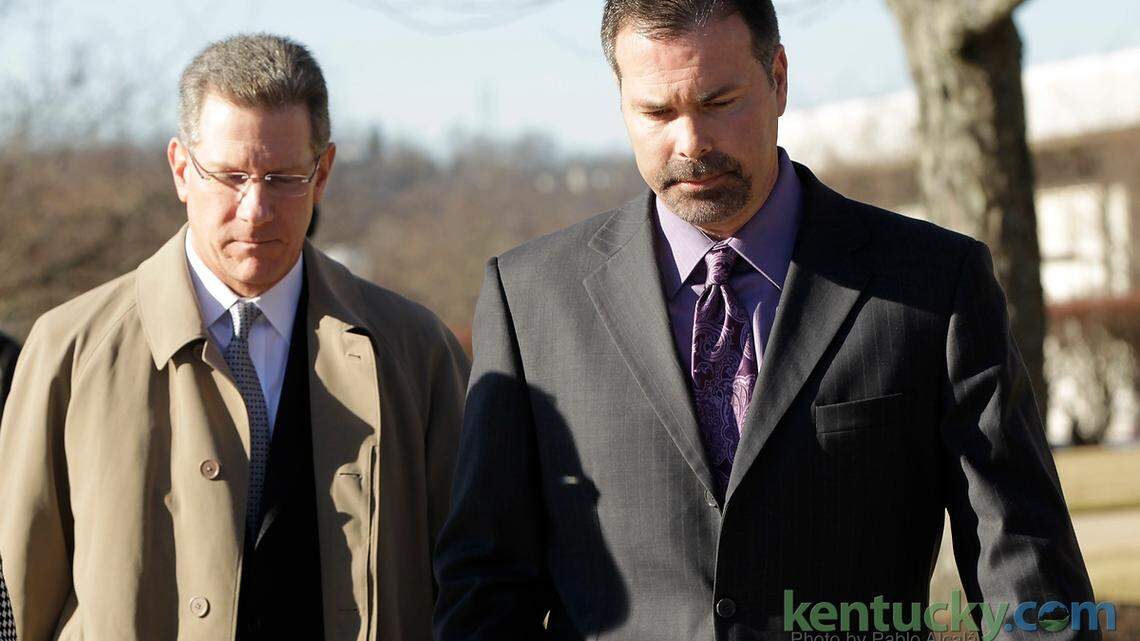 Richie Farmer, right, with his attorney, Guthrie True, left U.S. District Court in Frankfort on Tuesday afternoon after Farmer was sentenced to 27 months in prison for misusing state resources when he was Kentucky's agriculture commissioner.