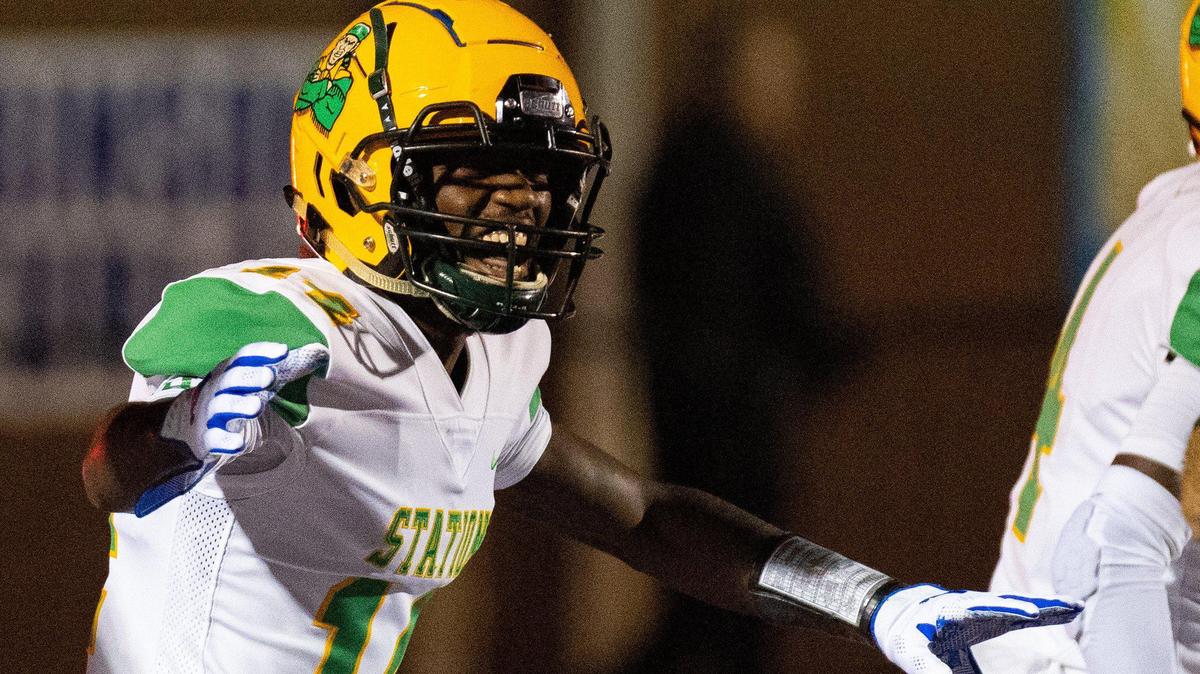 Bryan Station’s JaeVon Hurt, a first-team All-City selection, celebrated scoring a touchdown against Madison Central on Oct. 22. The Defenders won 23-13.